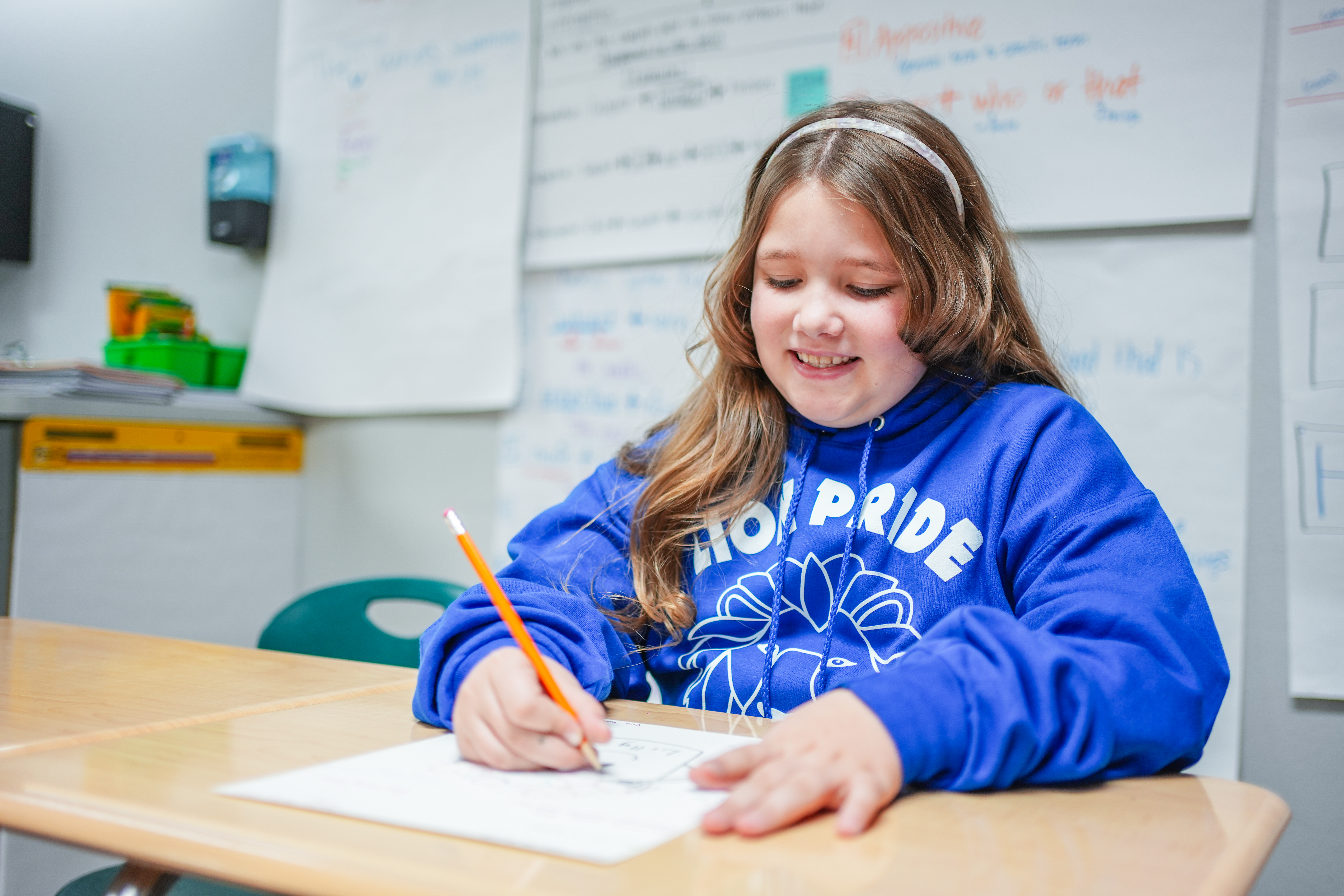 Middle school students working on academic projects